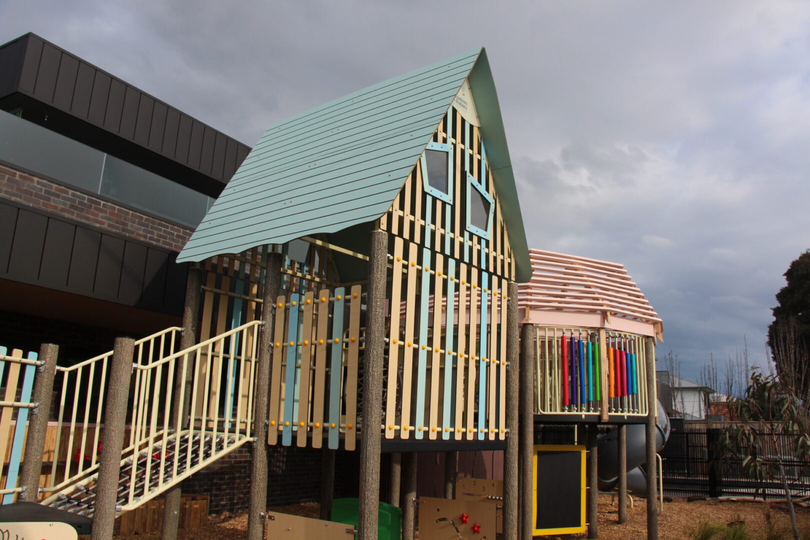 Colorful wooden huts for kids to play